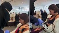 Πτήση Flydubai: Η εικόνα που προκάλεσε αντιδράσεις - Νοσοκόμα από τη Σαουδική Αραβία προσφέρει φροντίδα σε Ισραηλινή επιβάτιδα